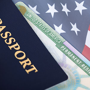 A photo of a US visa and passport - Serving Immigrants